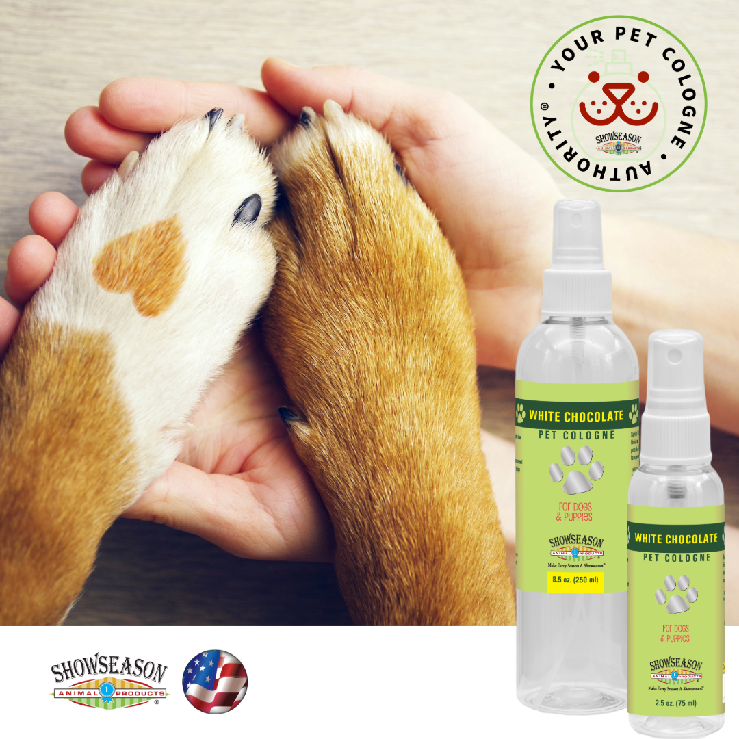 Dog paw and hands. Showseason White Chocolate Pet Cologne  in two bottle sizes, 8.5 oz and 2.5 oz.