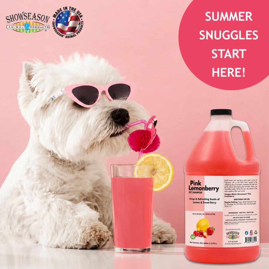 Dog wearing sunglasses drinking pink lemonade beside a gallon of Showseason® Pink Lemonberry Pet Shampoo on a soft pink background with “Summer Snuggles Start Here!” text and Showseason® Animal Products branding